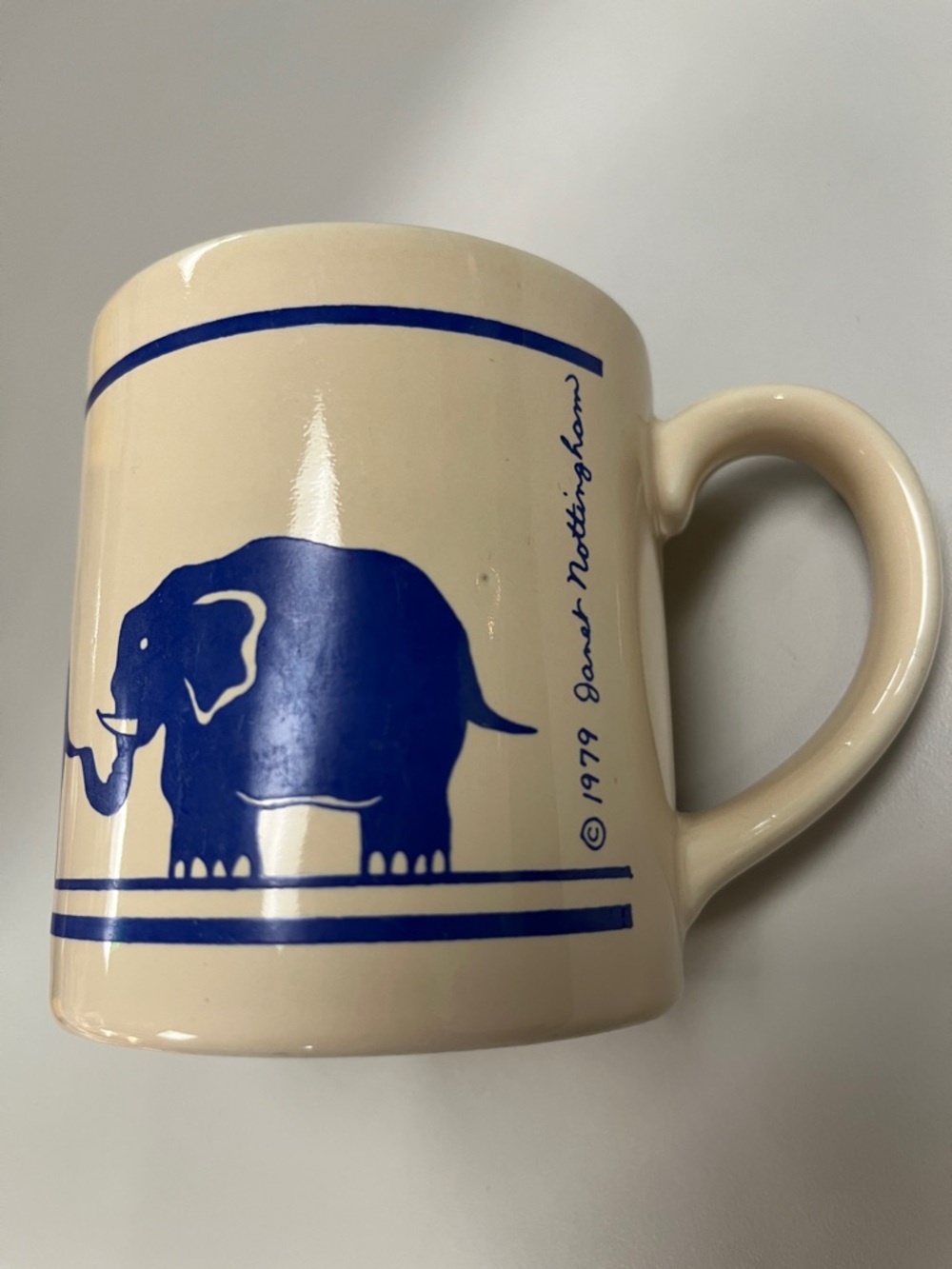 Boston Warehouse Janet Nottingham Cream Mug with Blue Elephant Design
